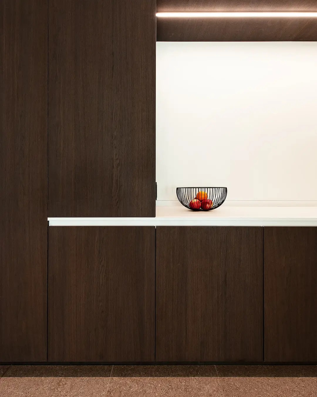 Office kitchen featuring RealGrain Knokke brunette timber-look panels.